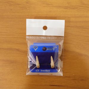 Elegant Curved Pavé Crystal Huggie Earrings in Gold Finish